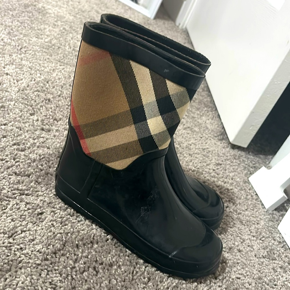 Definitely worn Kids Burberry Boots, still is Great condition!